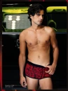 Nir Lavi in red shorts.