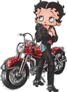 Betty Boop standing beside motorcycle