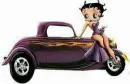 Betty Boop sitting on the hood of an old coup