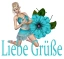 Woman kneels on flower