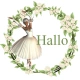 Woman stands in the flower wreath