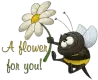 Honey bee with a flower